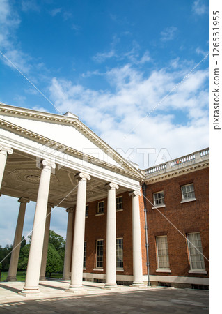 Osterley House, a historic building with red bricks and white stone pillars, on the outskirts of London 126531955