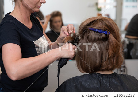 Experience a Professional Hair Styling Session at a Trendy, Modern Salon for All Your Needs Experience a Professional Hair Styling Session at a Trendy, Modern Salon for All Your Needs 126532238