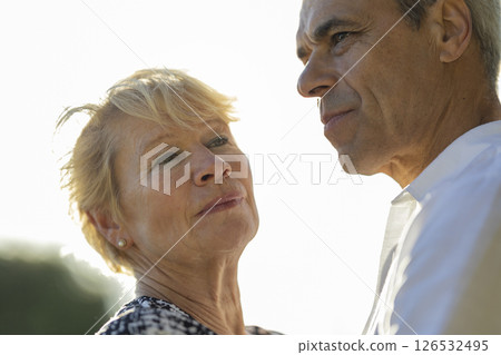 Senior couple looking away expressing concern and hope 126532495