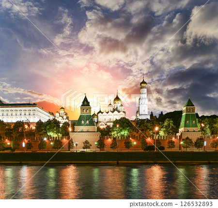 Night view of the Moskva River and Kremlin, Russia, Moscow (most popular view). Against the background of a beautiful sky with clouds Night view of the Moskva River and Kremlin, Russia, Moscow (most popular view). Against the background of a beautiful sky with clouds 126532893