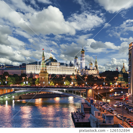 Night view of the Moskva River and Kremlin, Russia, Moscow (most popular view). Against the background of a beautiful sky with clouds Night view of the Moskva River and Kremlin, Russia, Moscow (most popular view). Against the background of a beautiful sky with clouds 126532894