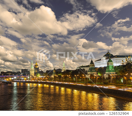 Night view of the Moskva River and Kremlin, Russia, Moscow (most popular view). Against the background of a beautiful sky with clouds Night view of the Moskva River and Kremlin, Russia, Moscow (most popular view). Against the background of a beautiful sky with clouds 126532904