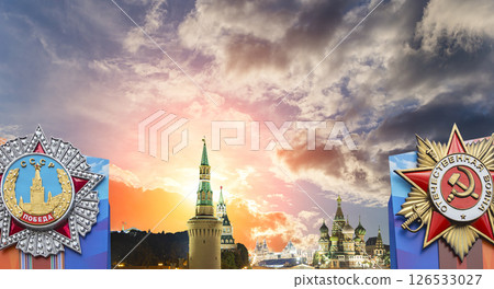 Moscow Kremlin (with orders of victory)--Victory Day celebration (WWII), Russia-- the most popular view. Against the sky with clouds. English translation from Russian: USSR, Victory, Patriotic war 126533027