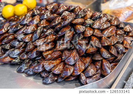 A lot of red mussels on sale in the store A lot of red mussels on sale in the store 126533141