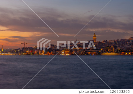 Galata Tower and Golden Horn bay at night. Istanbul, Turkey Galata Tower and Golden Horn bay at night. Istanbul, Turkey 126533265