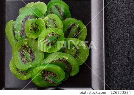 Dried sweet green kiwi or candied fruit Dried sweet green kiwi or candied fruit 126533884