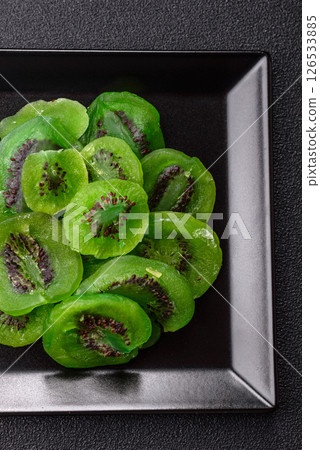 Dried sweet green kiwi or candied fruit Dried sweet green kiwi or candied fruit 126533885