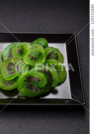 Dried sweet green kiwi or candied fruit 126533886