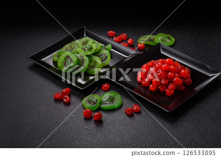 Dried sweet green kiwi or candied fruit Dried sweet green kiwi or candied fruit 126533895