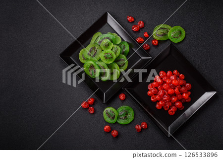 Dried sweet green kiwi or candied fruit Dried sweet green kiwi or candied fruit 126533896