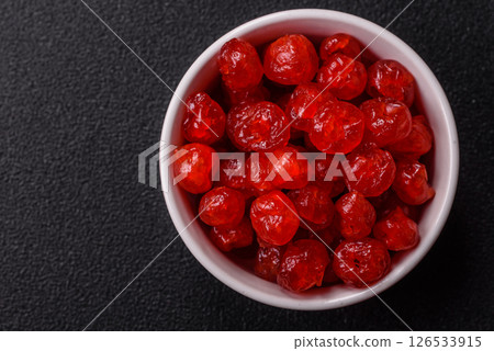 Dried sweet red pitted cherries or candied fruits 126533915