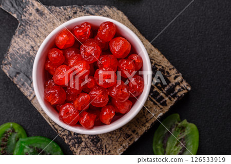 Dried sweet red pitted cherries or candied fruits Dried sweet red pitted cherries or candied fruits 126533919