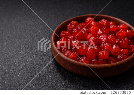 Dried sweet red pitted cherries or candied fruits 126533930