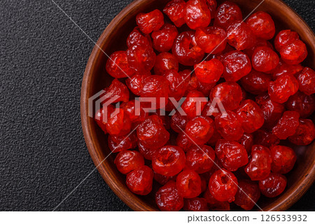 Dried sweet red pitted cherries or candied fruits 126533932