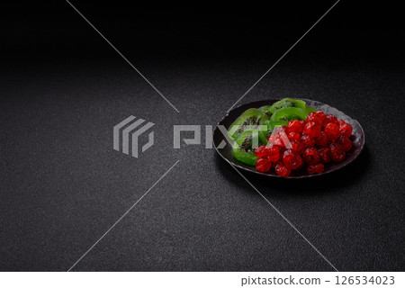 Dried sweet green kiwi or candied fruit 126534023