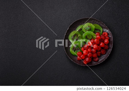 Dried sweet green kiwi or candied fruit 126534024