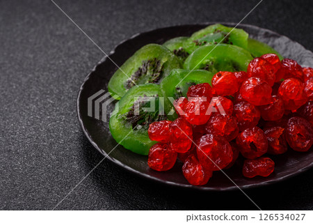 Dried sweet green kiwi or candied fruit Dried sweet green kiwi or candied fruit 126534027