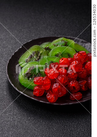 Dried sweet green kiwi or candied fruit Dried sweet green kiwi or candied fruit 126534030