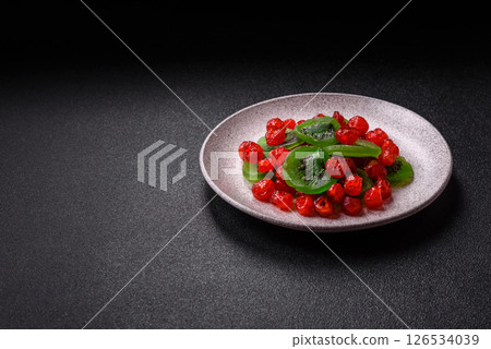 Dried sweet red pitted cherries or candied fruits Dried sweet red pitted cherries or candied fruits 126534039