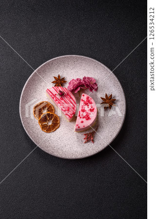 Sweet round tart cheesecake with raspberries or strawberries Sweet round tart cheesecake with raspberries or strawberries 126534212