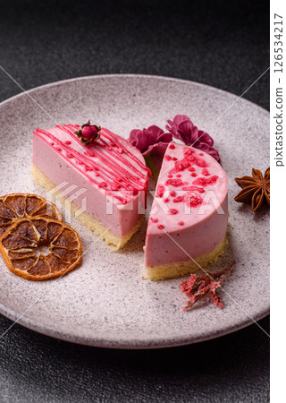 Sweet round tart cheesecake with raspberries or strawberries Sweet round tart cheesecake with raspberries or strawberries 126534217
