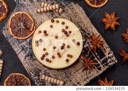 Sweet round tart three chocolates 126534235