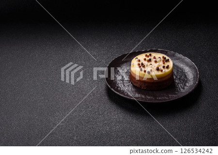 Sweet round tart three chocolates 126534242