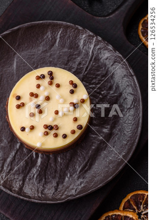 Sweet round tart three chocolates 126534256