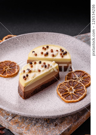 Sweet round tart three chocolates 126534286