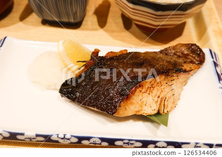 close up of Japanese roasted fish - Gindara Saikyo Yaki (Grilled White Miso Marinated Black Cod) on a plate close up of Japanese roasted fish - Gindara Saikyo Yaki (Grilled White Miso Marinated Black Cod) on a plate 126534406
