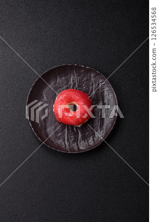 Donut shaped sushi rolls with salmon, shrimp and tuna Donut shaped sushi rolls with salmon, shrimp and tuna 126534568