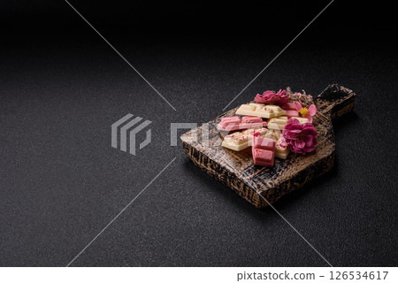Multicolored handmade chocolate bars pink, white, brown colors 126534617