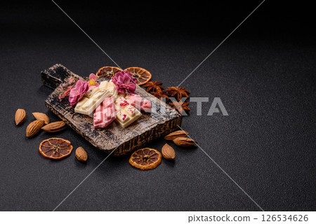 Multicolored handmade chocolate bars pink, white, brown colors 126534626