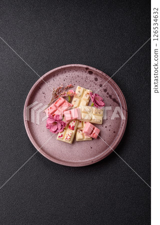 Multicolored handmade chocolate bars pink, white, brown colors Multicolored handmade chocolate bars pink, white, brown colors 126534632