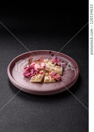 Multicolored handmade chocolate bars pink, white, brown colors 126534633