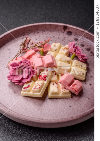Multicolored handmade chocolate bars pink, white, brown colors 126534637