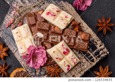 Multicolored handmade chocolate bars pink, white, brown colors 126534655