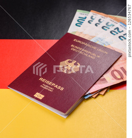 German citizen passport against the background of the German national flag 126534767