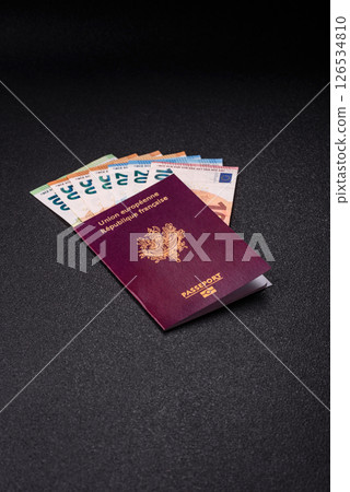 France citizen passport against the background of the France national flag France citizen passport against the background of the France national flag 126534810