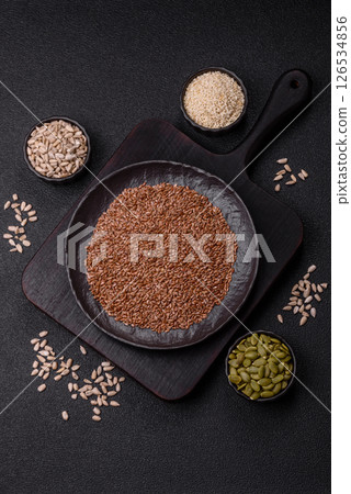Flax seeds in a bowl, an ingredient for making vegan or vegetarian food 126534856