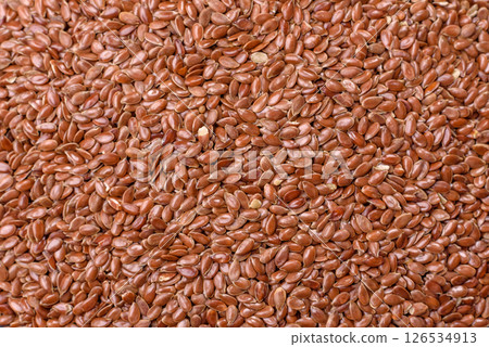Flax seeds in a bowl, an ingredient for making vegan or vegetarian food 126534913