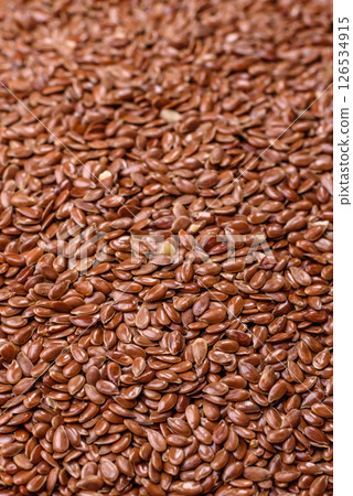 Flax seeds in a bowl, an ingredient for making vegan or vegetarian food 126534915