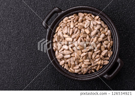 Peeled sunflower seeds in a bowl, an ingredient for making vegetarian food Peeled sunflower seeds in a bowl, an ingredient for making vegetarian food 126534921