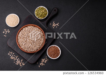 Peeled sunflower seeds in a bowl, an ingredient for making vegetarian food 126534960