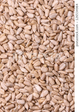 Peeled sunflower seeds in a bowl, an ingredient for making vegetarian food 126534964