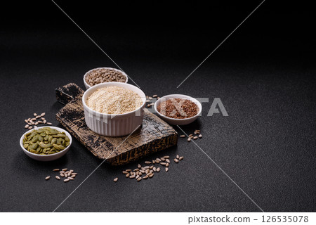 White sesame seeds in a bowl, an ingredient for making vegetarian food 126535078