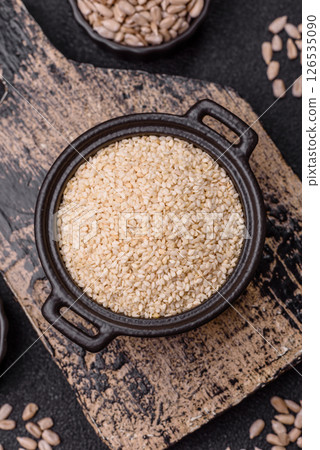 White sesame seeds in a bowl, an ingredient for making vegetarian food 126535090