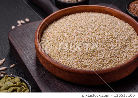 White sesame seeds in a bowl, an ingredient for making vegetarian food 126535100
