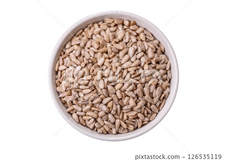 Peeled sunflower seeds in a bowl, an ingredient for making vegetarian food Peeled sunflower seeds in a bowl, an ingredient for making vegetarian food 126535119