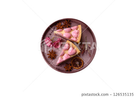 Sweet cheesecake with berry flavor, decorated with pink hearts 126535135
